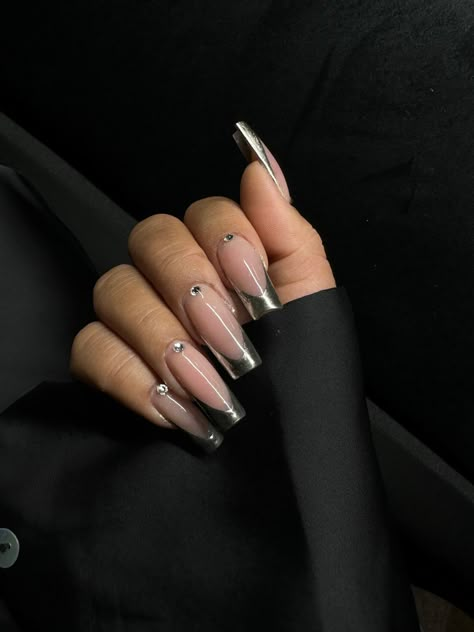 Chrome Nails Designs With Rhinestones, Gems In Nails, Chrome French Tip Nails With Rhinestones, Silver French Tip Nails With Cross, Gem On Nails, Chrome Rhinestone Nails, Chrome Nails Rhinestones, Silver Nails With Rhinestones, Gray Chrome French Tip Nails