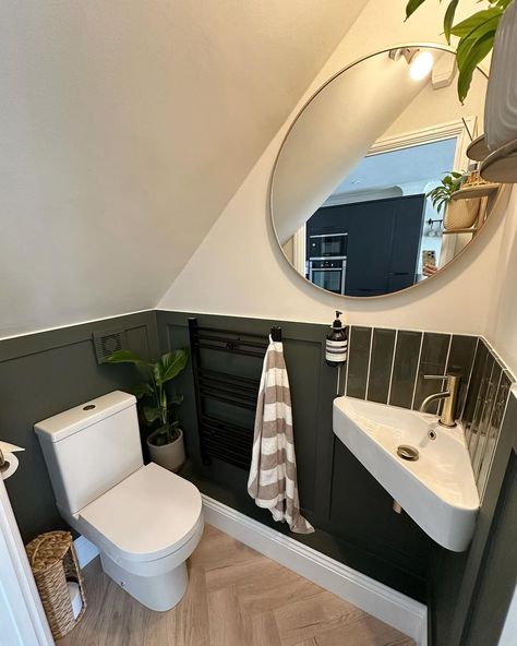 Tips to making a small downstairs bathroom come to life 🌿⁠
@kjhomespace⁠
⁠
1. Add panelling to give the room more definition⁠
2. Darker paint always is a fun idea in a small space⁠
3. A large mirror to give the illusion of a bigger space⁠
4. Corner sink to take up less room⁠
5. Adding different textures (tiles, paint, shelves, plants) to complete the interior ✨⁠
⁠
Swipe to see before 🤯⁠
⁠
#bathroom #smallbathroomideas #howtodecorate #interior #smallspace  #bathroomrenovation Tiny Bathroom Sloped Ceiling, Panelled Small Bathroom, Under Stairs Loo Downstairs Toilet, Corner Bathroom Sink Cabinet, Downstairs Toilet Corner Sink, Corner Sink Bathroom Mirror, Small Bathroom Ideas Under Stairs, Tiny Corner Sink, Powder Room With Corner Sink