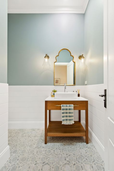 Love so many things about this space. The horizontal vj boards in Dulux Australia Vivid White with Porter's Paints Newport Blue above and the custom timber vanity stand, the marble mosaic floor tiles, brass and glass mirror and wall sconces and the warm, soft blue walls. Please and thankyou… @emaclawtonlighting Porters Paints Australia, Marble Mosaic Floor Tile, Porters Paints, Dulux Australia, Soft Blue Walls, Marble Mosaic Floor, Mosaic Floor Tiles, Porter Paint, Newport Blue