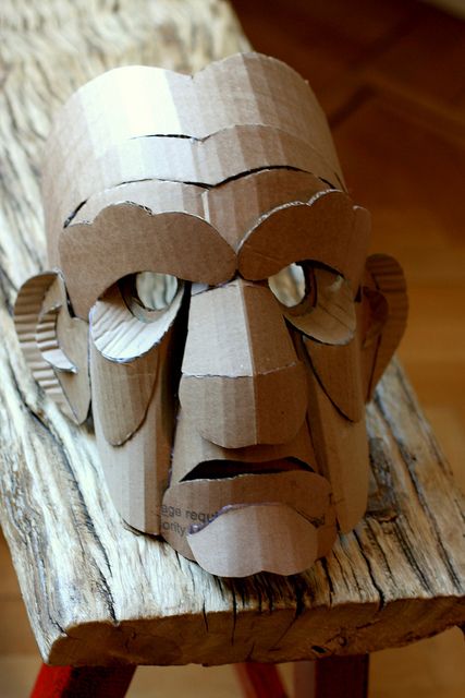 https://www.facebook.com/pages/Shop-Drawings-Service/255839464589611?ref=hl                                                                                                                                                                                 Más Old Man Mask, Cardboard Costume, Cardboard Mask, Folding Origami, Cardboard Sculpture, Paper Mask, Cardboard Art, Masks Art, Cardboard Crafts