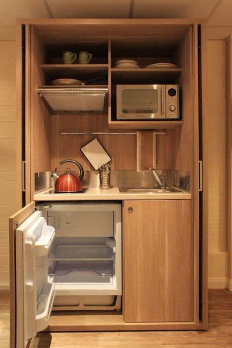 Hotel Kitchenette, Concealed Kitchen, Micro Kitchen, Small Kitchenette, Tiny Kitchen Design, Minimalist Studio, Kitchen Appliance Storage, Small Apartment Kitchen, Hidden Kitchen