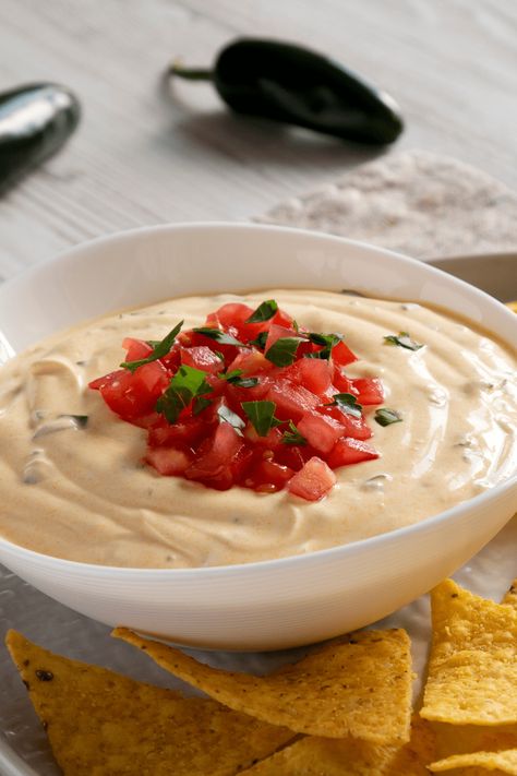 Bring the taste of Qdoba into your own home with this Qdoba Queso copycat recipe! It's cheesy, delicious, and way cheaper than takeout! Qdoba Queso Recipe, Hot Dip Recipes, Mini Burritos, Dip Recipes Hot, Mexican Appetizers, Queso Recipe, Cheese Sauce Recipe, Recipes With Few Ingredients, Smoked Cheese