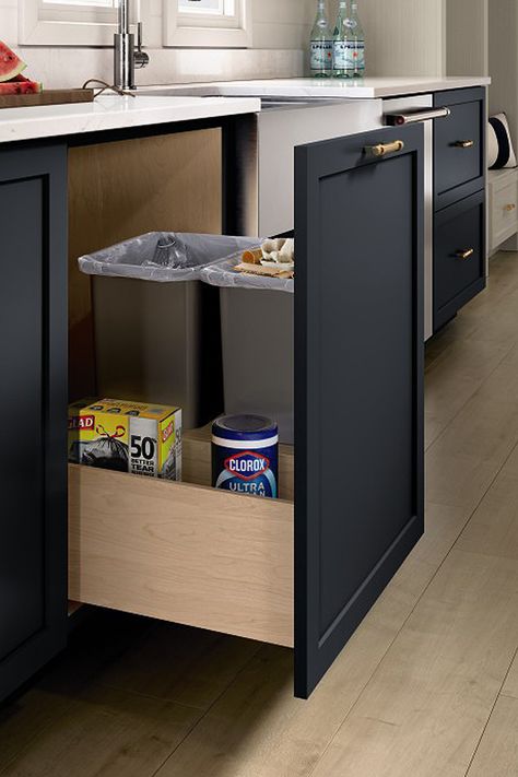 This pull-out waste bin fully extends for ease of removal. The storage compartment at the back keeps garbage bags close at hand. Organizing Ideas Pantry, Kitchen Garbage Can Storage, Pantry Organizing Ideas, Organization Ideas Pantry, Garbage Can Storage, Kitchen Waste Bin, Trash Can Cabinet, Storage Organization Ideas, Modern Kitchen Remodel