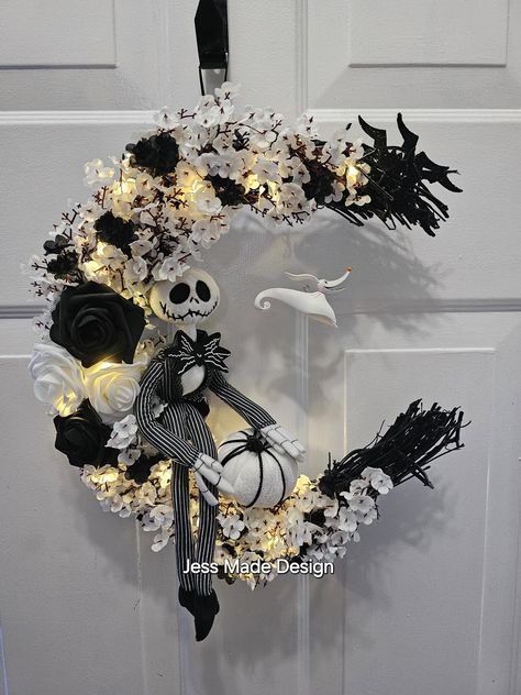 Skeleton moon wreath, Black and white home decor, Crescent moon wreath, Bat wreath, Skull wreath, Gift, Gothic wreath, 14" This lovely skeleton moon wreath is perfect for your gothic home decor. It's black and white colors are a beautiful touch to your dark interior style. Give as a gift for a Halloween wedding, birthday, or anniversary to anyone who loves moons, skulls, and all things gothic.  Made with a grapevine base painted black. Plush character. Plush/foam pumpkin. Glitter foam bats (no s Crescent Moon Wreath Diy Christmas, Moon Wreath Diy, Bike Wheel Wreath, Moon Wreaths, Gothic Wreath, Bat Wreath, Crescent Moon Wreath, Nightmare Before Christmas Wreath, Halloween Maze