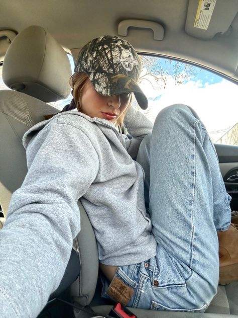 Camouflage hat, grey hoodie, baggy jeans, platform uggs outfit Car Outfit Pics Selfie, Green Trucker Hat Outfit, Camo Cap Outfit, Camo Hat Outfits Women, Camo Hat Outfit, Camo Hats Outfits, Green Hat Outfit, Platform Uggs, Platform Outfit