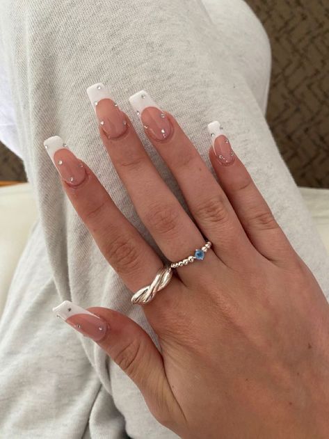 White Nails With Rhinestones French Tips, White French Tip Nails With Crystals, White Decorated Nails, White French Tip W Pearls, Nail Inspo White Tip, Square French Tip With Diamonds, White With Diamonds Acrylic Nails, White French Tip Nails Coffin With Gems, White French Tip Nails Coffin Design