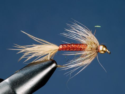 15 Trout Flies You Must Tie | Fly Tyer Fly Tying Patterns Trout, Beginner Fly Tying, Best Trout Flies, Fly Fishing Nymphs, Fly Fishing For Beginners, Fly Tying Desk, Trout Fishing Tips, Fly Fishing Lures, Fly Fishing Flies Pattern