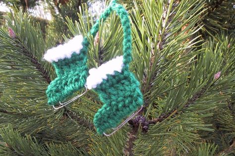 I've been making this little ornament since 1972, when we moved to Sparks, NV. We moved into a brand new home, just a few days before Chr... Ice Skate Ornaments, Pickle Ornament, Christmas Crochet Patterns Free, Crochet Snowman, Crochet Xmas, Crochet Christmas Decorations, Crochet Christmas Trees, Ice Skate, Crochet Ornaments