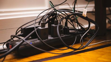 How to organize messy cords at home - CNET Hide Your Tv, Hide Cable Box, Tv Cords, Floor Moulding, Cable Management Box, Hide Cords, Hidden Tv, Hide Wires, Organizing Wires