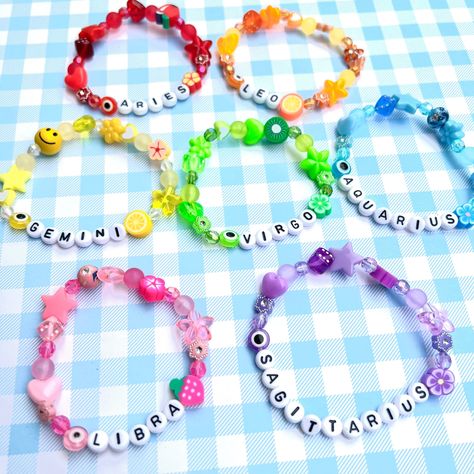 BEADS BRACELETS #BeadedBracelets Star Sign Beaded Bracelets, Bracelet Ideas With Evil Eye, Clay Bead Bracelet Zodiac, Mismatched Beaded Bracelet, Zodiac Sign Beaded Bracelets, Zodiac Sign Clay Bead Bracelets, Festival Bead Bracelets, Cute Words To Put On Beaded Bracelets, Zodiac Sign Bracelet Clay Beads