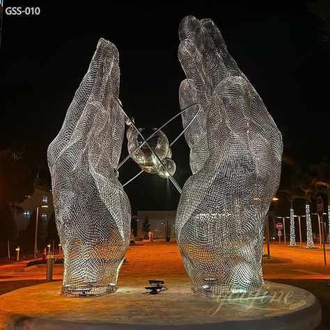 Precision crafted from stainless steel wire mesh, hand sculptures illuminate your outdoor space and can be customized to fit your unique vision. Hand Sculptures, Wire Mesh Sculpture, Mesh Sculpture, Public Sculpture, Hand Sculpture, Steel Sculpture, Metal Art Sculpture, Steel Mesh, Wire Mesh