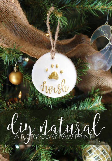 DIY natural organic pet cat dog paw print ornament modern script stamps Clay Paw Print, Dog Paw Print Ornament, Pet Gift Basket, Paw Ornament, Paw Print Ornament, Dog Breeding, Handprint Ornaments, Dough Ornaments, Diy Air Dry Clay