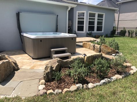 Hot tub hardscape & landscape... travertine spa lanai, boulders, river rocks Pavers For Hot Tub, Hot Tub Landscape, Patio Paver Designs Layout, Flagstone Steps, Hot Tub Landscaping, Hot Tub Patio, Rustic Landscaping, Mulch Landscaping, Patio Pavers Design