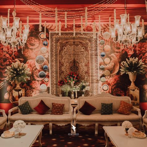 Royal Theme decor done for a Sangeet night inspired by Sabyasachi's aesthetics Red Theme Sangeet Decor, Sabyasachi Theme Decor, Royal Sangeet Decor, Sabyasachi Wedding Decor, Sufi Theme Decor, Sabyasachi Decor, Sabyasachi Aesthetic, Enchanted Wedding Decor, Wedding Guest Seating