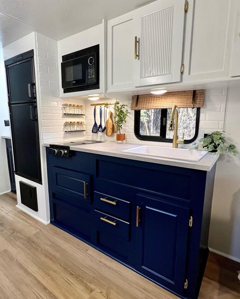 Navy Blue Rv Cabinets, Rv Blue Cabinets, Navy Blue Camper Interior, Navy Caravan Interior, Pole Wrap Cabinet, Ikea Countertop, Camper Projects, Bus Homes, Rv Updates