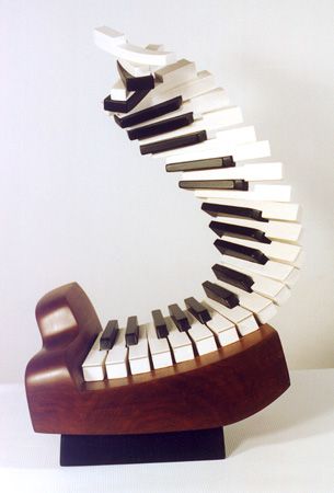 Piano keyboard statue Key Sculpture, Piano Instrument, Keyboard Sculpture, Music Sculpture Art, Piano Parts Art, Piano Sculpture, Cardboard Art Projects, Piano Crafts, Music Sculpture