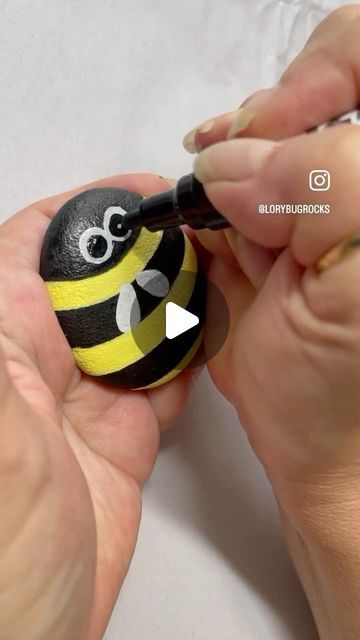 Lory Aucelluzzo on Instagram: "Let’s grab our paint pens and create a cute bee rock for summer. 🐝🐝🐝
#easycrafts" Ladybugs Painted On Rocks, Bumblebee Painted Rocks, Rock Art Painting Ideas, Bees Rock Painting, Painted Rocks Bees, Bumble Bee Rock Painting, Painting On Stones And Rocks, How To Paint A Bee, Rock Painting Tutorial Step By Step