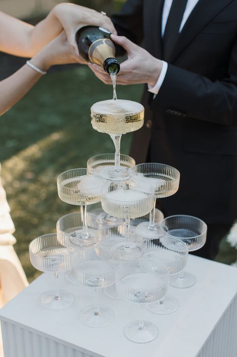 Wedding champagne tower Champagne Tour Wedding, Champagne Tower Wedding Diy, Champagne Tower How To, Champagne Wedding Tower, Outdoor Champagne Tower, Prosecco Tower Wedding, Small Champagne Tower Wedding, Champagne Pour Wedding, Diy Champagne Tower