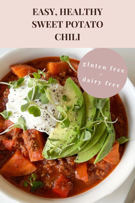 This easy healthy sweet potato chili is gluten free, dairy free, refined sugar free, plant based, paleo, high protein, veggie packed, and can be made vegan.  In a white soup bowl is a serving of freshly cooked chili with softened sweet potatoes, peppers, tomatoes adding a red color to the broth, ground beef and spices are mixed in. Topped with a dollop of white sour cream, sliced green avocado, and a pinch of microgreens. The perfect cozy fall meal. Callas Clean Eats, Chili Gluten Free, Potato Chili, Sweet Potato Chili, Stuffed Sweet Potato Healthy, Beef Bone Broth, Fall Recipe, Protein Recipes, Gluten Free Dinner