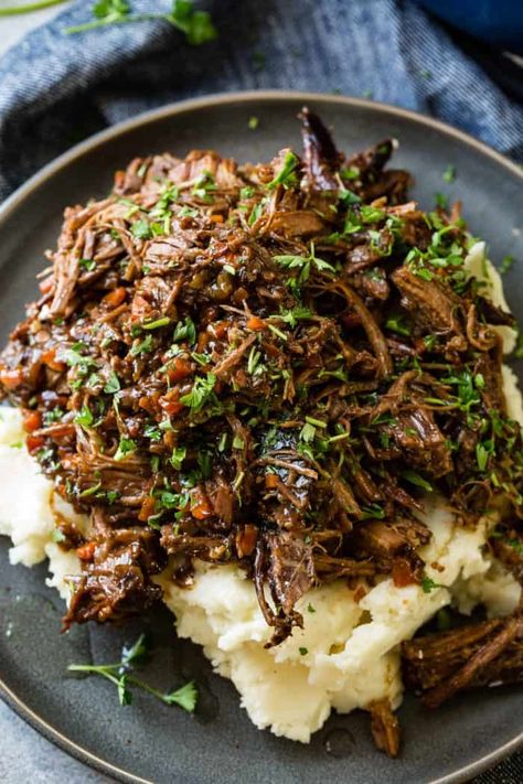 Our readers and are the very best! This recipe is a direct result of a question from a reader. Someone asked if she didn't have ribs, if she could make our Oven Braised Short Ribs with a roast. We started testing and ta da!!! Oven Braised Beef Roast - a juicy, tender, fall apart braised beef roast in a luscious sauce. #roast #beef #braised #meat #dinner #dinnerrecipe #recipe #beefitswhatsfordinner #comfortfood Unique Beef Roast Recipes, Braised Deer Roast, Angus Roast Recipes, Braised Sirloin Tip Roast, Beef Chuck Arm Roast Recipes, Braised Tri Tip Roast, Chuck Roast Recipes Cast Iron, Beef Thanksgiving Dinner Ideas, Beef Cross Rib Roast Recipes