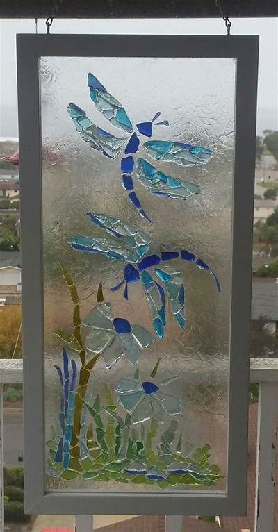 Pin by Deanna Richey on sea glass mosaics | Sea glass mosaic, Sea glass art, Beach glass crafts Framed Glass Art, Dragonfly Glass Art, Resin Stained Glass Window, Sea Glass Mosaic Ideas, Seaglass Dragonfly, Fused Glass Garden Art, Glass Collage Art, Glass Mosaic Patterns, Glass On Glass Mosaic Window