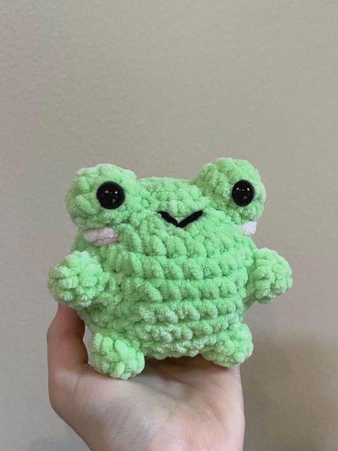 These frog plushes are hand crocheted by me with love! They are perfect for gifts, or if you want a little frog friend for yourself.   To find other colors and variations of this plush, look for my other frog plush listings on my site. Please message me with any questions or for custom orders. -Each frog is hand crocheted, stuffed, and sewn by me, so yours may vary from the listing photo, meaning each one is unique! -This item contains small parts that may come apart with rough handling, and may not be suitable for children under 3 years of age