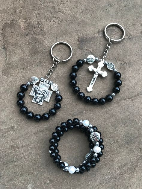 This rosary bracelet and key ring set was designed by Carole as a custom order, but is available for anyone. If you only want part of the set please message me on Etsy. The gemstone beads are black agate and the bracelet includes fresh water pearls. This bracelet is for a very small wrist however it can be made for other sizes. The set comes in organza gift bags and instructions and suggestions for prayer are included. Join the Perles of Wisdom online community by copying this link into your bro White Rosary, Catholic Rosary Bracelet, Rosary Jewelry, Custom Rosary, Christian Bracelets, Bead Crochet Patterns, Catholic Jewelry, Rosary Bracelet, Beads Bracelet Design