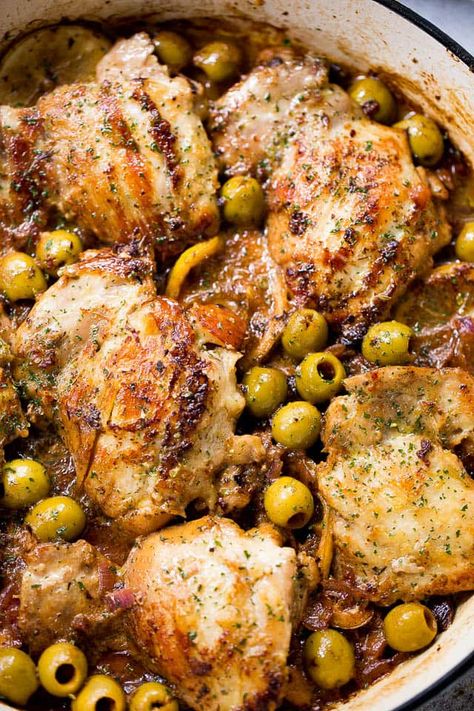 Saucy Skillet Chicken with Lemons and Olives - Delicious pan seared chicken thighs prepared with olives, lemons, and red wine. Chicken And Olives, Pan Seared Chicken Thighs, Seared Chicken, Chicken Skillet Recipes, Pan Seared Chicken, Easy Chicken Thigh Recipes, Olive Recipes, Chicken With Olives, Mediterranean Chicken