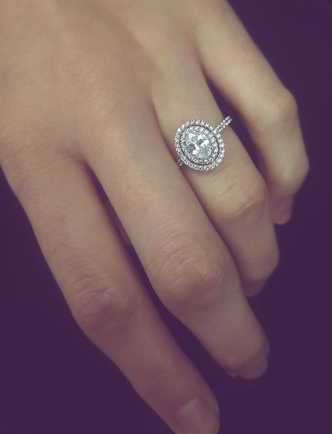 Did you know halo engagement rings are the 2nd most popular engagement ring style? Besides being gorgeous, they are also the cheapest and most efficient way to make your ring look BIGGER and shinier. Check out these 20+ halo engagement ideas you will love. // mysweetengagement.com // #engagement #engagementrings #diamondrings #uniqueengagementrings #haloengagementrings Oval Double Halo Engagement Ring, Engagement Ring With Wedding Band, Halo Oval Engagement Ring, Double Halo Engagement Ring, Double Halo Engagement, Oval Diamond Engagement, Oval Diamond Engagement Ring, Topaz Engagement Ring, Oval Engagement