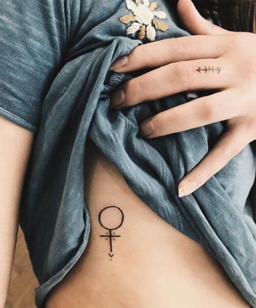 16 Feminist Tattoos That Actually Mean Something Female Empowerment Tattoo, Empowerment Tattoo, Feminist Tattoos, Pattern Tattoos, Venus Tattoo, Minimalist Tattoo Meaning, Feminist Tattoo, Paris Tattoo, Typography Tattoo