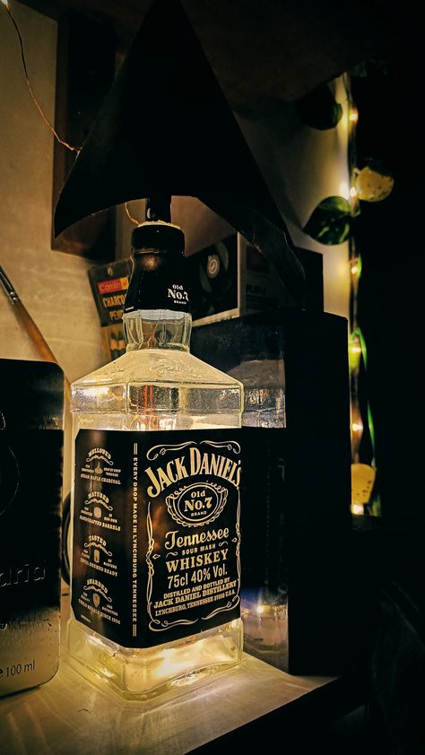 This was taken at my friend's place. His wife decorated this small area with the bottle of Jack Daniels... Jack Daniels Distillery, Jack Daniel, Jack Daniels, Whiskey