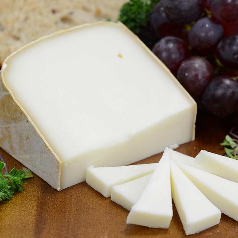 from Mazères-Lezons, France. Made in the foothills of the Pyrenees Mountains, Melange Brebis is made up of a mix of sheep and goat’s milk, creating a smooth, supple texture with earthy flavors. https://www.farmersmarketonline.com/cheese Pyrenees Mountains, Sheep And Goat, Specialty Foods, Pyrenees, Farmer's Market, Farmers Market, Goats, Farmer, Sheep