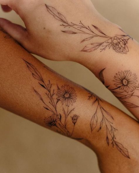 Vine Women Tattoo, Wrap Around Wrist Tattoos Daisy, Aster Flower Wrap Around Tattoo, Vine Tattoos Fine Line, Sunflower Vines Tattoo, Iris Wrap Around Tattoo, Vine Tattoo Wrist Wrap Around, Forearm Daisy Tattoo Women, Vine Tattoo With Birth Flowers