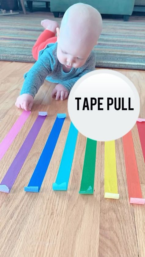 ✨FLASHBACK FRIDAY✨ 🌈TAPE PULL🌈 This one was so much FUN! As soon as Karmella saw the tape on the floor she couldn’t get over to it fast enough. This kept her busy for about 15-20mins. This is also a great activity for little ones during tummy time to encouraging movement. To make it more challenging for older kids you can criss cross the tape over each other so it becomes a puzzle of which tape to peel first. You can also set up on the floor, on a wall, or on a table. *Always supervise wh My Body Activities For Infants, Infant Manipulative Activities, Infant Fine Motor Activities Daycare, Infant Invitation To Play, Low Stimulation Activities, Infant Tummy Time Activities, Pincer Grasp Activities For Babies, Sensory Activities For Babies 6 Months, Velcro Activities For Toddlers