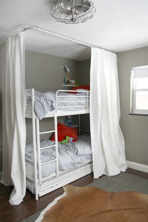 looks like 3 beds there with a trundle How to Use IKEA KVARTAL Track Curtains In Every Room | Apartment Therapy Bunk Bed Curtains, House Tweaking, Cctv Installation, Bunk Bed Mattress, Aluminum Ceiling, Bed Unit, Modern Bunk Beds, Cool Bunk Beds, Bunk Beds With Stairs