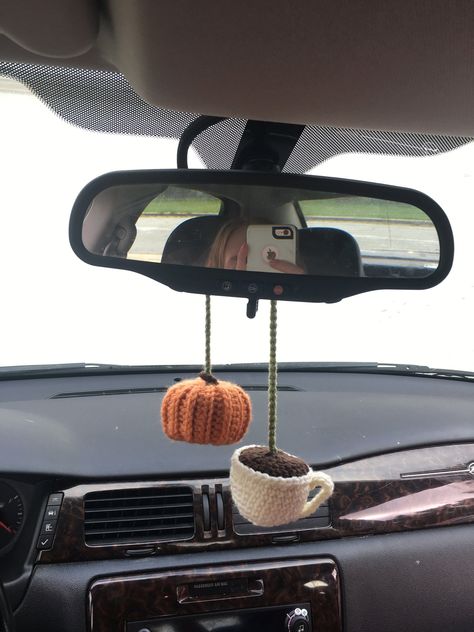 Hang your favorite pumpkin latte from your car mirror with this stylish and functional car accessory. Perfect for the fall season, this hanger will add a touch of autumn flair to your car.

#pumpkinlatte #carmirrorhanger #fall #autumn Crochet Things To Hang In Car, Fall Car Interior Decor, Crochet Fall Car Hanger, Cute Car Mirror Accessories, Car Fall Decor, Car Decorations Interior Boho, Fall Car Decor, Cute Car Interior Ideas Decor, Cute Car Decor Ideas