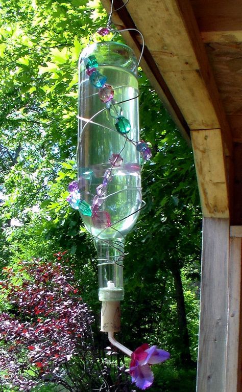 Bird Feeder Station Ideas, Homemade Hummingbird Feeder, Diy Hummingbird Feeder, Bird Feeder Hangers, Bird Feeder Station, Bird Feeder Stands, Wine Bottle Bird Feeder, The Frugal Crafter, Feeder Bottle