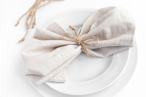 Jute twine napkin decoration to elevate the place settings on the table and keep the napkins beautifully folded Rustic Wedding Glasses, Wedding Napkin Folding, Napkin Ties, Wood Table Numbers Wedding, Wedding Table Place Settings, Christmas Napkin Folding, Wooden Table Numbers Wedding, Easy Napkin Folding, Rustic Table Centerpieces