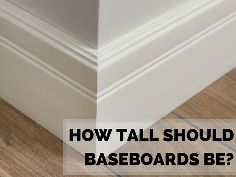 We break down popular baseboard heights based on style and other factors. Small Baseboard Trim, Tiled Baseboard Bathroom, Cottage Baseboards And Trim, Popular Baseboard Styles, 4 Inch Baseboard Trim, Modern Baseboards And Trim Ideas, Floor Boards Trim Ideas, Kitchen Baseboards, 5 Inch Baseboards