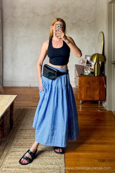 I love this easy spring/summer outfit idea. A classic striped maxi skirt with a tank top, sandals, and a fanny pack to make it more casual. This is the Sebastian skirt from Doen, and it is so soft, lightweight, and comfortable to wear. #springoutfitideas #summeroutfitideas #maxiskirtoutfit #doen #coastalaesthetic Skirts And Tank Tops Outfit, Stripe Skirt Outfit, Striped Skirt Outfit, Tank Tops Outfit, Maxi Skirt Outfit Summer, Maxi Skirt Outfit, Striped Maxi Skirt, Maxi Skirts Summer, Long Skirt Outfits