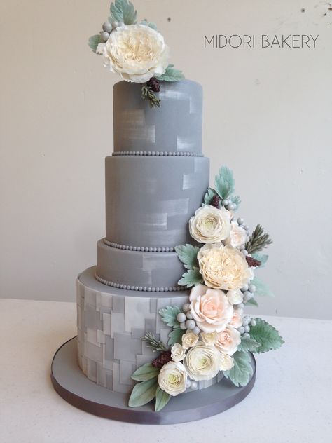 Grey Geometric wedding cake with fondant tiles and silver brush stroke accents… Grey Wedding Cakes, Blue Grey Wedding Cake, Grey Wedding Cake Ideas, Early Grey Cake, Grey Cake Ideas, Grey Colour Cake Design, Gray Wedding Cake, Geometric Wedding Cakes, Fondant Wedding Cakes