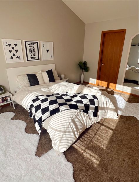 gender neutral room - black and white room - funky rug - white rug - checkered blanket - malm bed - posters above bed - Gender Neutral Couples Bedroom, Black And White Checkered Rug Aesthetic, Bed Rooms Ideas Black And White, Checkered Bedding Aesthetic Room, White Comforter With Black Accents, Black And White Carpet Bedroom, Bedroom Ideas Checkered, Simple College Bedroom Ideas, Checkered Rug Black And White