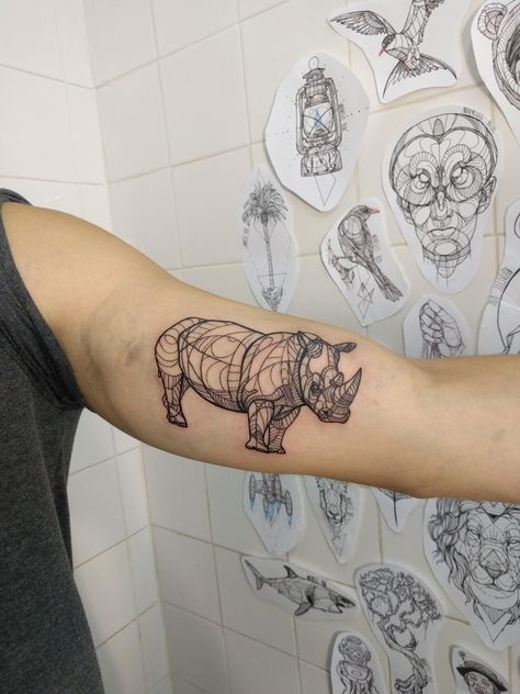 Rhinoceros linework by Nouvelle Rita at Big Boys Tattoo in Lisbon Portugal Tattoo Website Design, Rhino Tattoos, 17 Tattoo, Template Tattoo, Boys Tattoo, Rhino Tattoo, Tattoo Website, Hunter Tattoo, R Tattoo