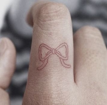 Bow Ring Tattoo, Ribbon Finger Tattoo, Coquette Finger Tattoos, Bow Around Finger Tattoo, Bow Finger Tattoo, Bow On Pinky Tattoo, Bow Finger Tattoos For Women, Bow Finger Tattoos, Bow Tattoo