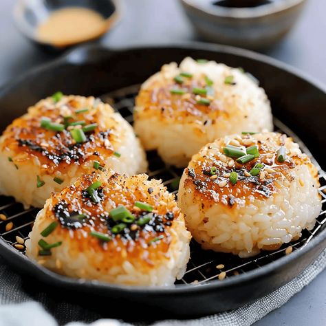 If you’re a fan of Japanese cuisine and looking for a twist on the classic rice ball, then this recipe for Miso Butter Grilled Rice Balls is just the adventure ... Read more How To Make Rice Balls Recipes, Asian Rice Balls, Grilled Rice Balls, Rice Beer, Rice Balls Recipe, Unique Side Dishes, Grilled Rice, Hand Food, Miso Butter