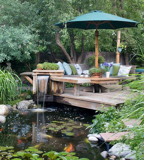 If you want to add pizazz to your yard, use these deck decorating ideas to create the outdoor retreat of your dreams. These designs will inspire you to start on your backyard project so you can enjoy your porch or patio for the rest of the summer. Kolam Koi, Fish Pond Gardens, Taman Air, نباتات منزلية, Pond Landscaping, Pond Design, Fish Ponds, Ponds Backyard, Beautiful Backyards