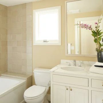 Pale Yellow Bathroom Walls, Light Yellow Bathroom Ideas, Soft Yellow Bathroom, Pastel Yellow Bathroom, Light Yellow Bathroom, Pale Yellow Bathroom, Pale Yellow Bathrooms, Yellow Tile Bathroom Ideas, Bathroom With White Cabinets