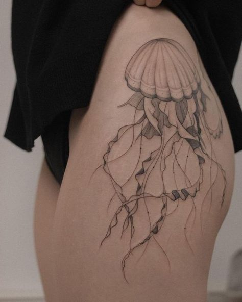 Discover the art of transformation with jellyfish tattoos in our article. Explore it and find 50+ stylish designs with meanings explained. Jellyfish Tattoo Design, Jellyfish Tattoo, Wicked Tattoos, Hip Tattoos Women, Stylist Tattoos, Thigh Tattoos Women, Large Tattoos, Elegant Tattoos, Hip Tattoo