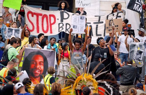 Thousands of protesters filled the streets of St. Paul on Friday night and 18 were arrested after a jury acquitted the police officer who shot Philando Castile. Philando Castile, Injustices In The World, Woman Singing, St Paul, What Is Life About, Current Events, Police Officer, Black Lives, Black Lives Matter