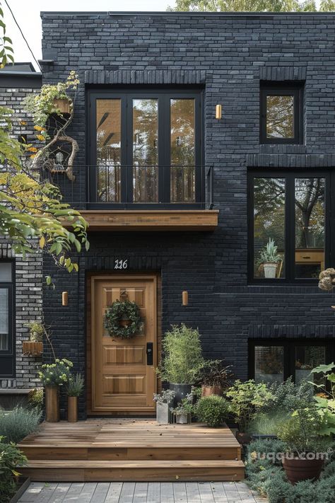 Black Brick House: Timeless Elegance for Your Home - Puqqu Black Brick House Exterior, Black Brick House, Modern Brick House, Painted Brick Exteriors, Photography House, Townhouse Exterior, Painted Brick House, Black Houses, Architecture Nature